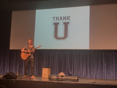 Fly strumming a few chords during the event to show how music is involved in everything we do.