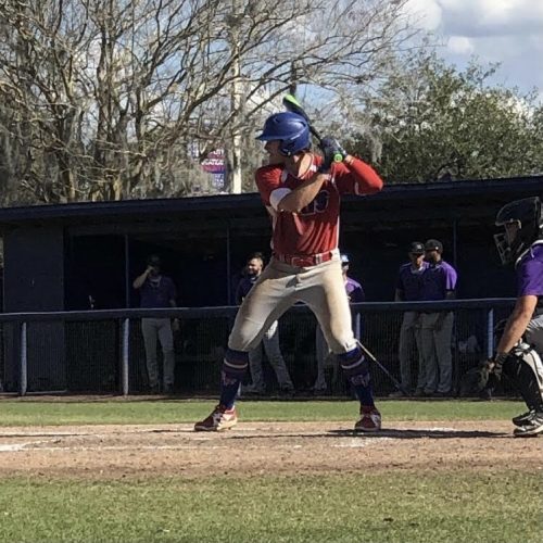 First baseman, Jackson Taylor, #24, bats in the bottom of the second inning. He would later double to right-field scoring Spencer Stephens #8 and Edrick Felix #2