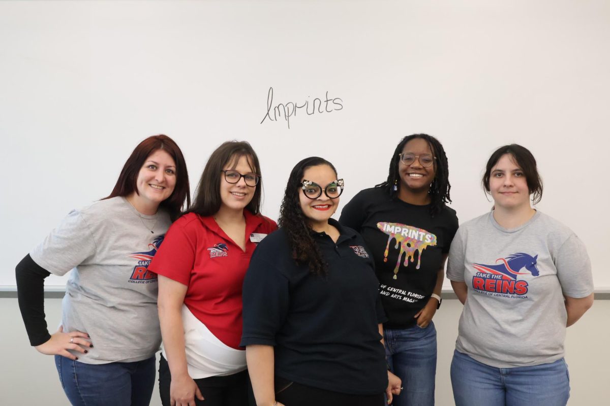 The Imprints team poses for a photo.